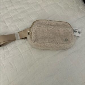 lululemon athletica Shearling Crossbody Belt Bag in Light Beige